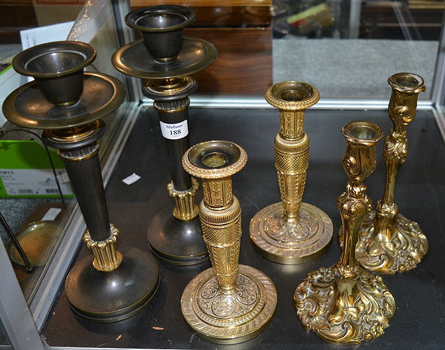 Appraisal: Pair of bronze and gilt metal classical style candlesticks cm