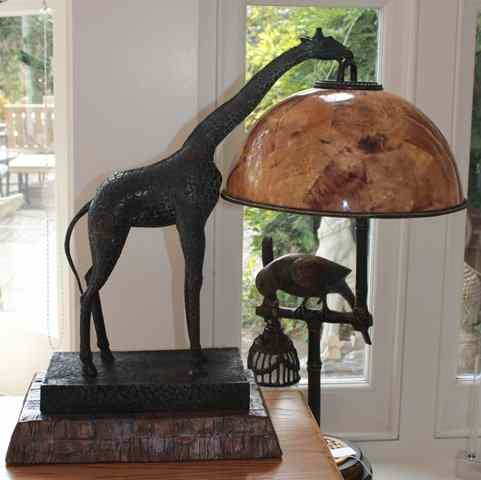 Appraisal: A BRONZED TABLE LAMP in the form of a giraffe