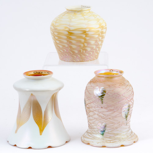 Appraisal: QUEZAL Three assorted art glass shades one in pulled feather