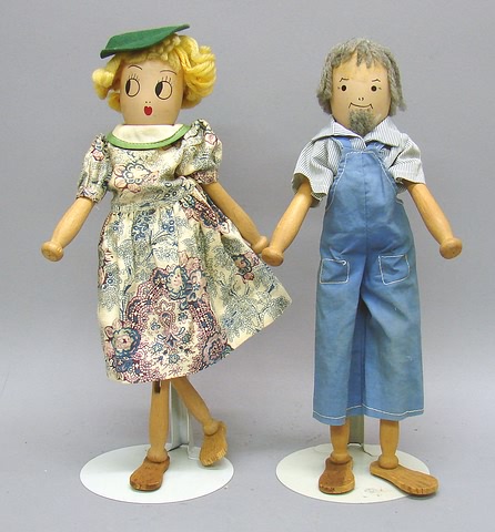 Appraisal: Pair of wooden clothespin dolls Marked Patent Pending St Paul