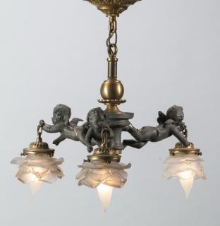 Appraisal: Empire style bronze putti chandelier h Empire style putti chandelier