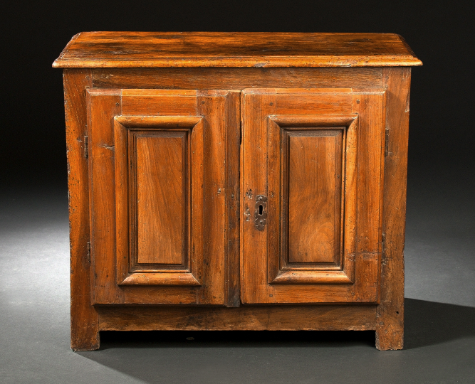 Appraisal: Provincial Fruitwood Cupboard early th century the rectangular top above