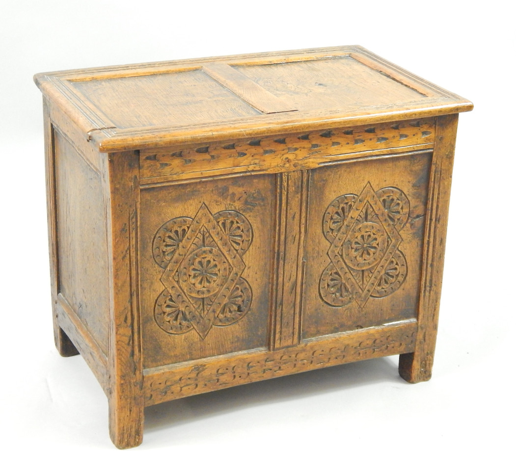 Appraisal: An oak linen chest of small proportions carved to the