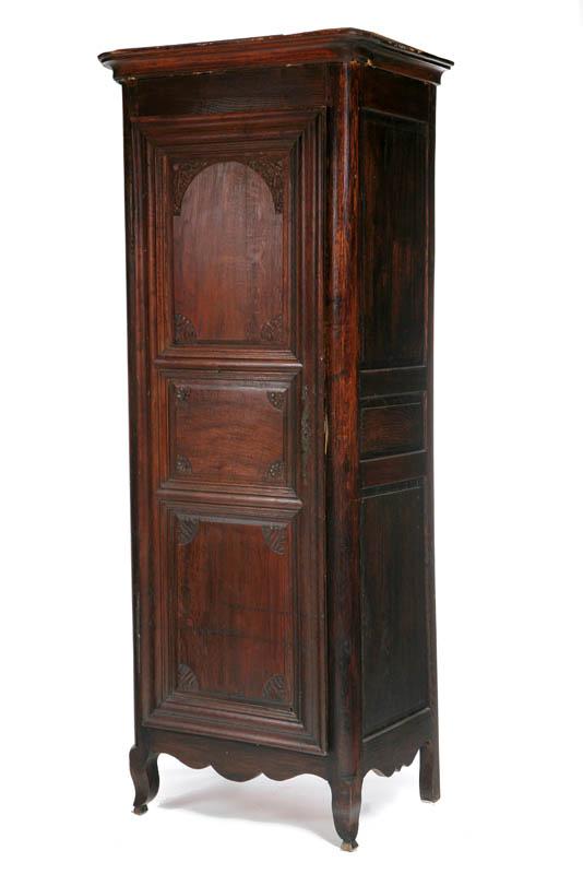 Appraisal: ARMOIRE France th century oak Narrow proportions with carved panels