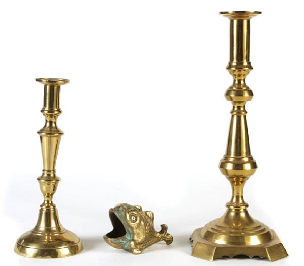 Appraisal: A group of seven pairs of brass candlesticks together with