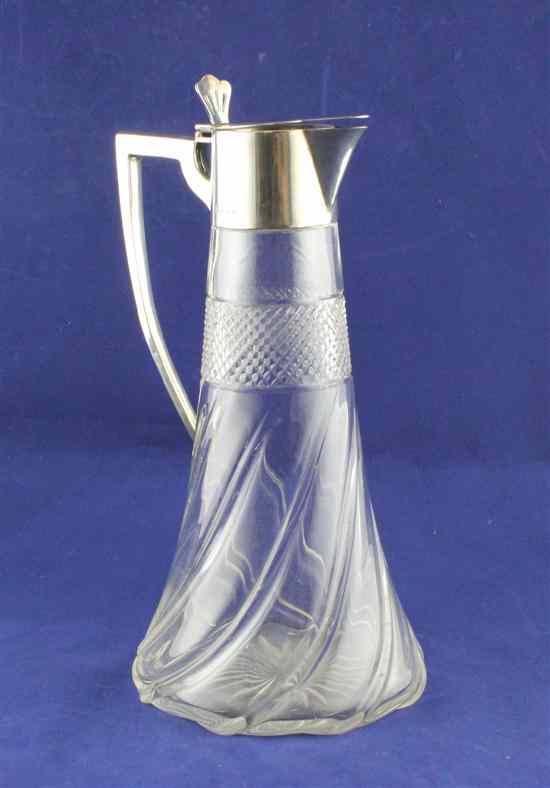 Appraisal: A George V silver mounted wrythen glass claret jug of