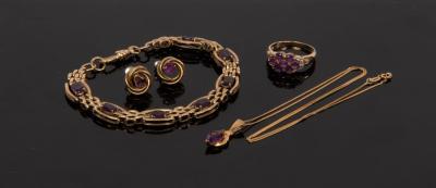 Appraisal: A ct yellow gold and amethyst bracelet set with seven