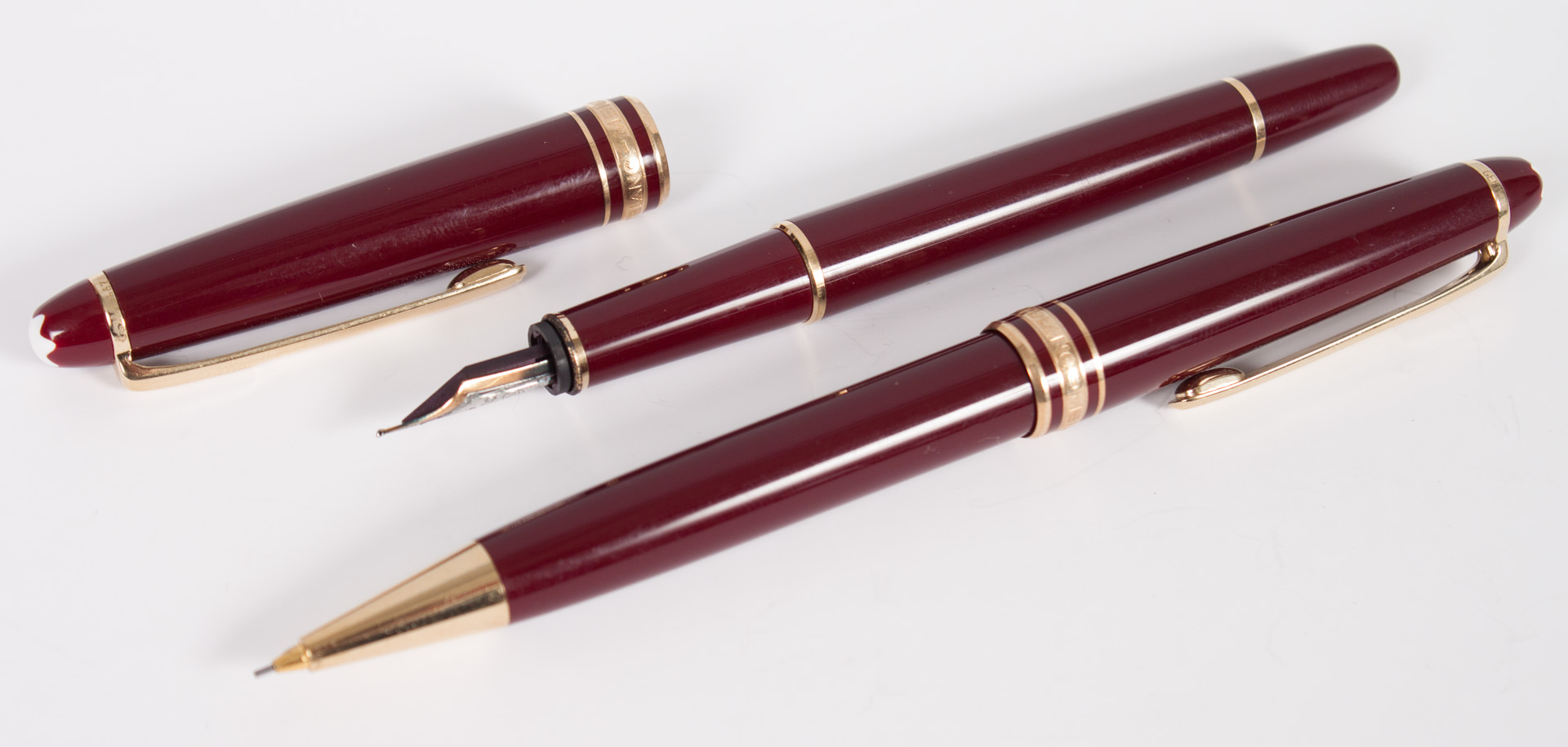 Appraisal: Montblanc Meisterstuck pen and pencil matching burgundy cases