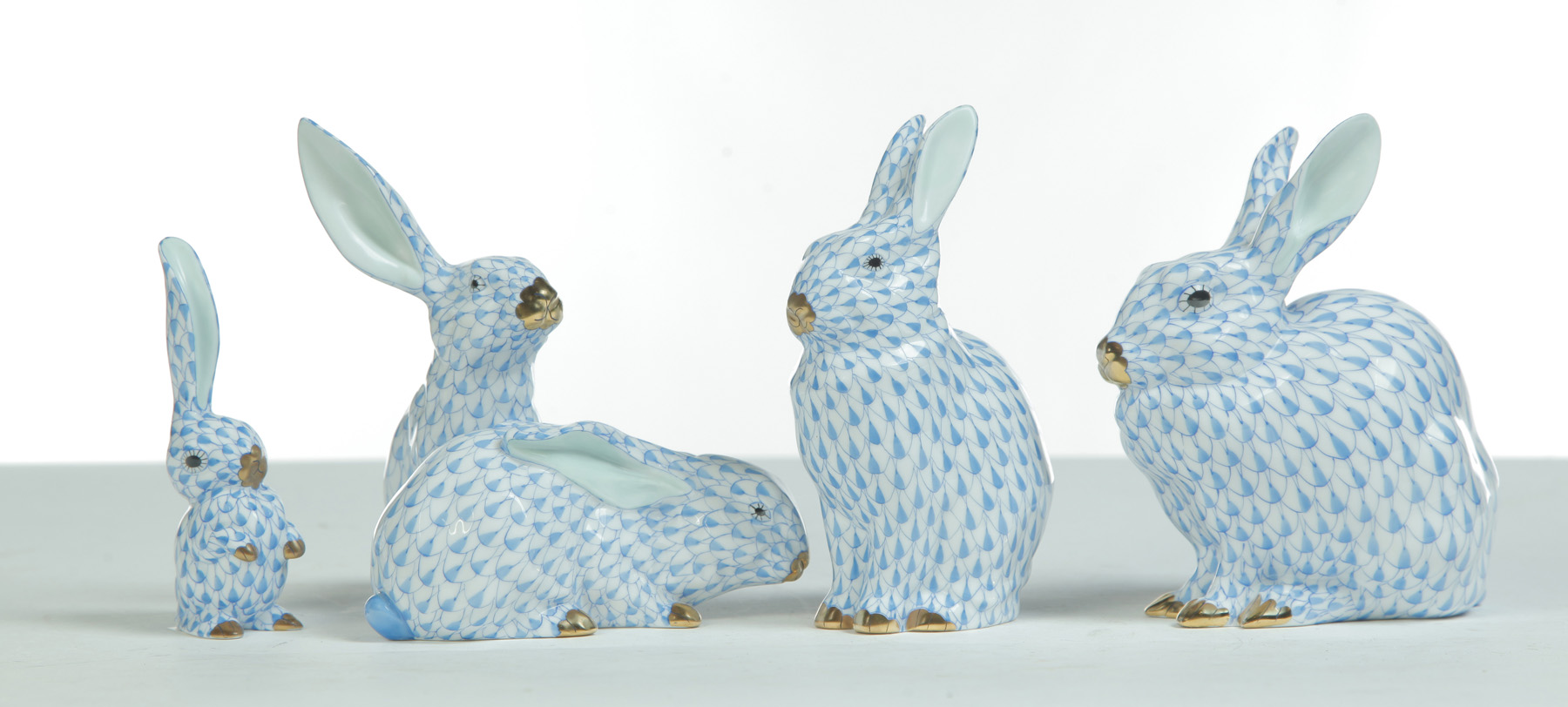 Appraisal: FOUR PIECES OF HEREND HAND PAINTED RABBIT FIGURES Hungary th