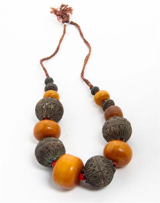 Appraisal: Sale Lot An Amber and Metal Beaded Necklace having six