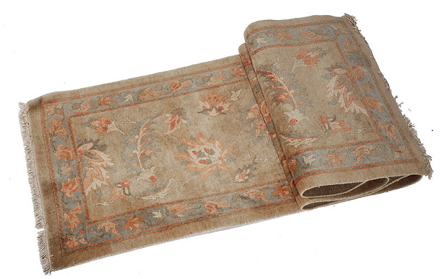 Appraisal: A TABRIZ PASTEL GROUND RUNNER with central acanthus foliate decoration