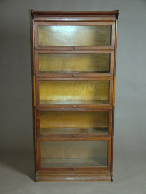 Appraisal: A light oak 'Globe Wernicke' style five division bookcase th