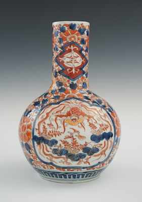 Appraisal: A Large Imari Bottle Vase Meiji Period The large glazed