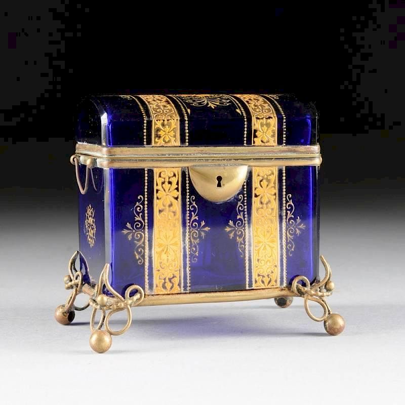 Appraisal: A BOHEMIAN COBALT BLUE GLASS GILT METAL MOUNTED CASKET CIRCA