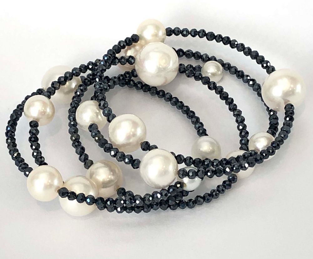 Appraisal: mm x mm White Cultured Pearl Bracelet on Flexible Spinel