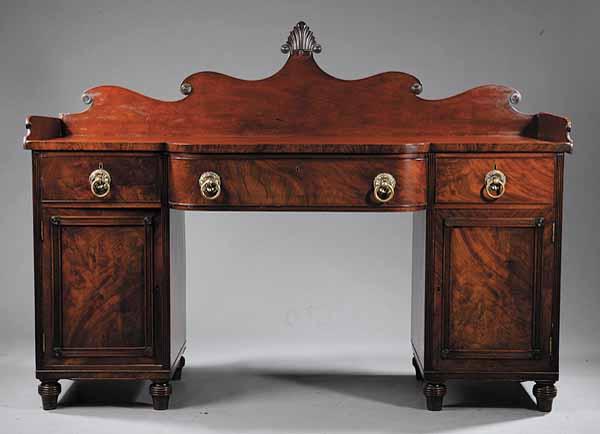 Appraisal: A George IV Mahogany Sideboard c the scrolled backsplash cresting