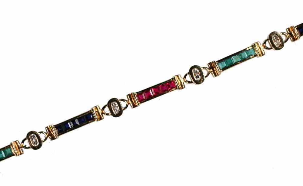 Appraisal: BRACELET - K yellow gold ruby emerald blue sapphire and