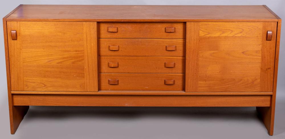 Appraisal: DOMINO MOBLER TEAK SIDEBOARD CIRCA the rectangular case fitted centrally