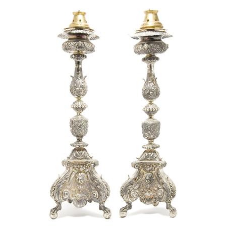 Appraisal: Pair of Continental Silvered Metal Altar Sticks Estimate -