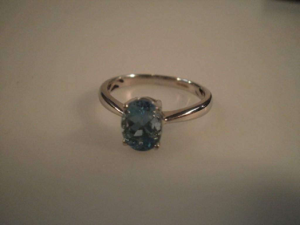 Appraisal: A dress ring set with a pale turquoise stone mm