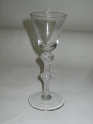 Appraisal: A GEORGIAN WINE GLASS c the conical bowl on double