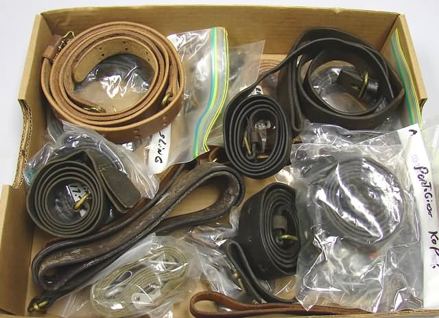 Appraisal: Lot of various leather gun slings including Japanese type s