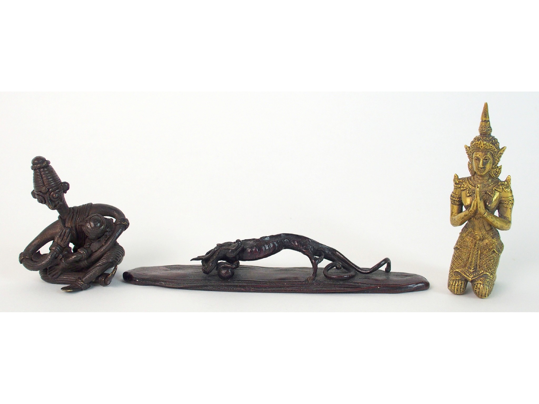 Appraisal: A Japanese bronze model of a dragonwith a ball on