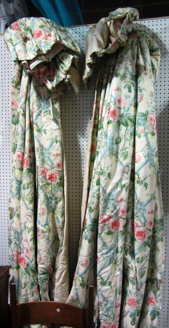 Appraisal: Two pairs of cream floral lined curtains and two pelmets