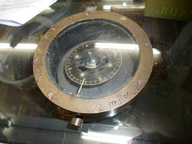 Appraisal: AN OLD TYPE O A MILITARY COMPASS with brass body