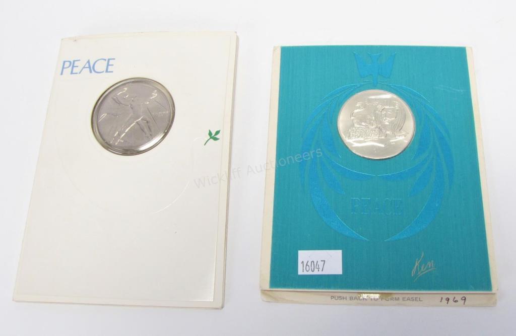 Appraisal: Two Franklin Mint Sterling peace coins including Franklin Mint Lion