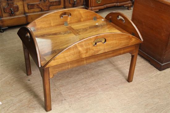 Appraisal: COFFEE TABLE Mahogany with drop down sides resting on square