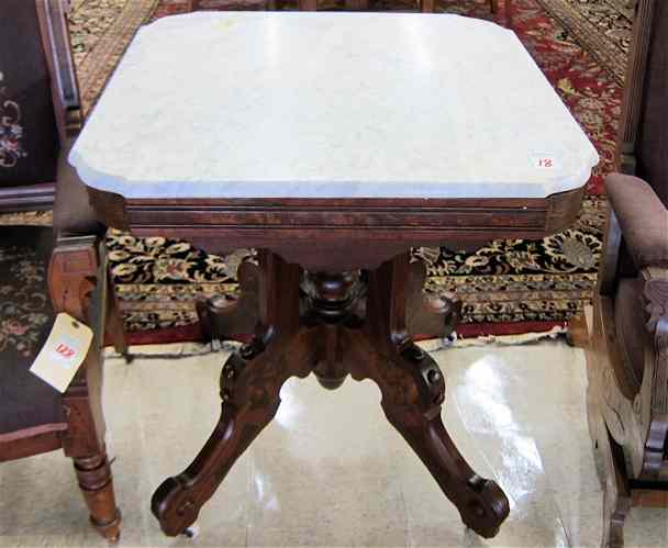 Appraisal: VICTORIAN MARBLE-TOP LAMP TABLE Renaissance Revival design American c having