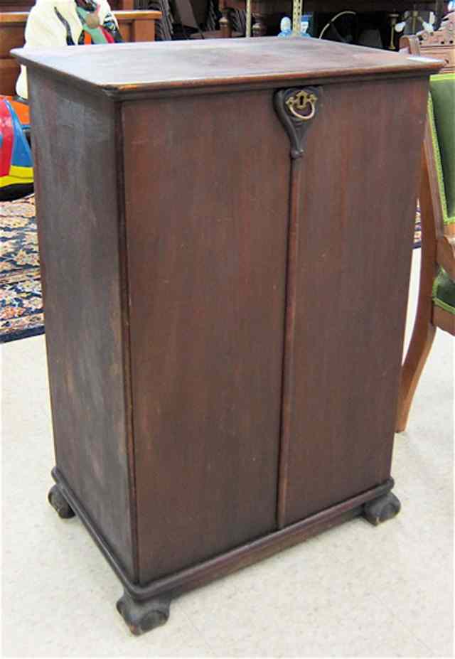 Appraisal: MAHOGANY RECORD STORAGE CABINET American c having two plain doors