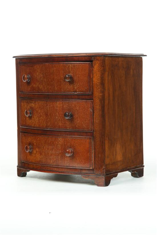 Appraisal: MINIATURE BOWFRONT CHEST OF DRAWERS Late th-early th century mahogany