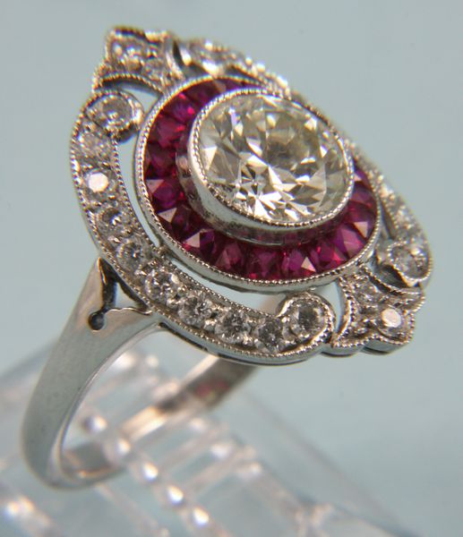 Appraisal: 's Art Deco platinum diamond and ruby ring ct center