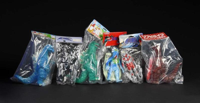 Appraisal: Large Lot of Vinyl Figures Description Japanese Bear Model Tsuburaya