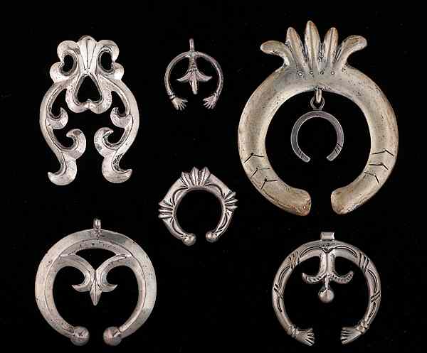 Appraisal: Navajo Silver Tufa-Cast Naja Pendants Collected by Virginia Doneghy -