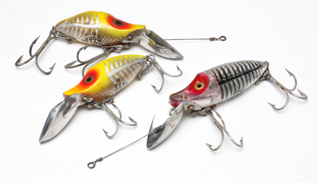 Appraisal: TWENTY-FOUR HEDDON FISHING LURES American second half th century Including