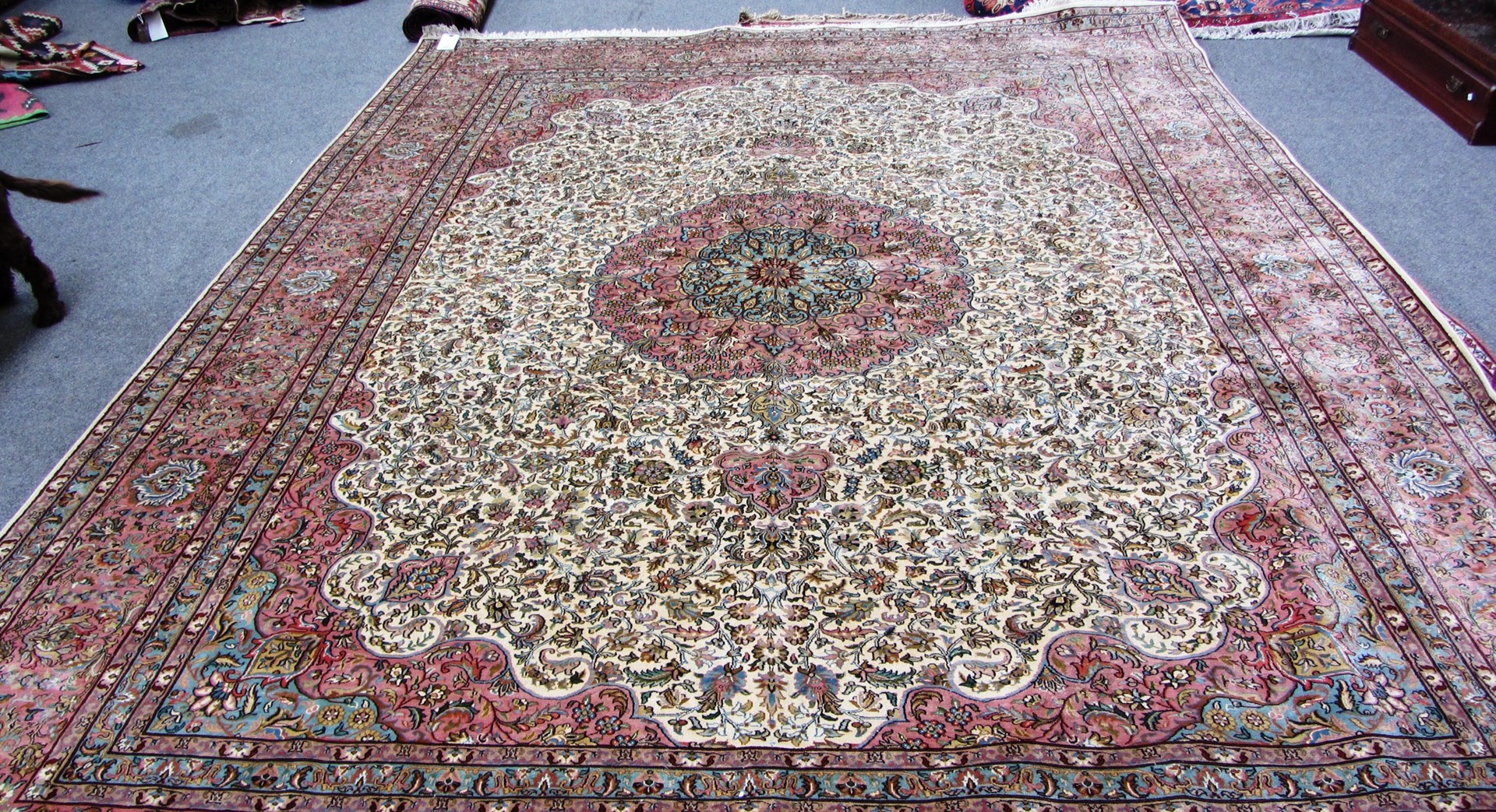 Appraisal: A Kashan silk carpet Persian the ivory field with a