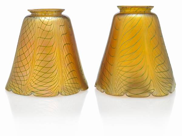 Appraisal: A pair of Steuben decorated gold Aurene glass shades shape