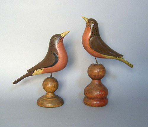 Appraisal: Two contemporary carved and painted birds h and h Provenance