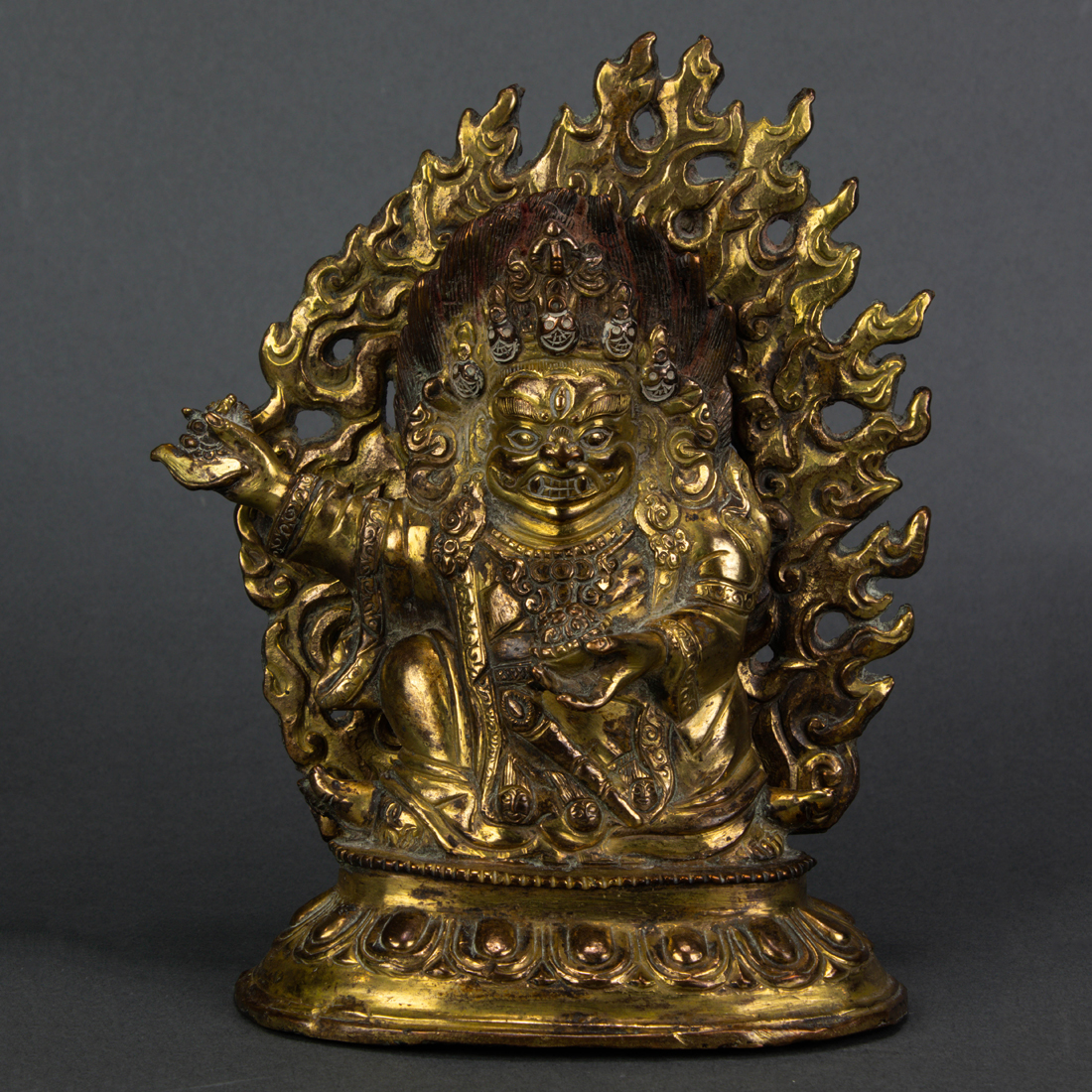 Appraisal: HIMALAYAN GILT BRONZE FIGURE OF JAMBHALA Himalayan gilt bronze figure