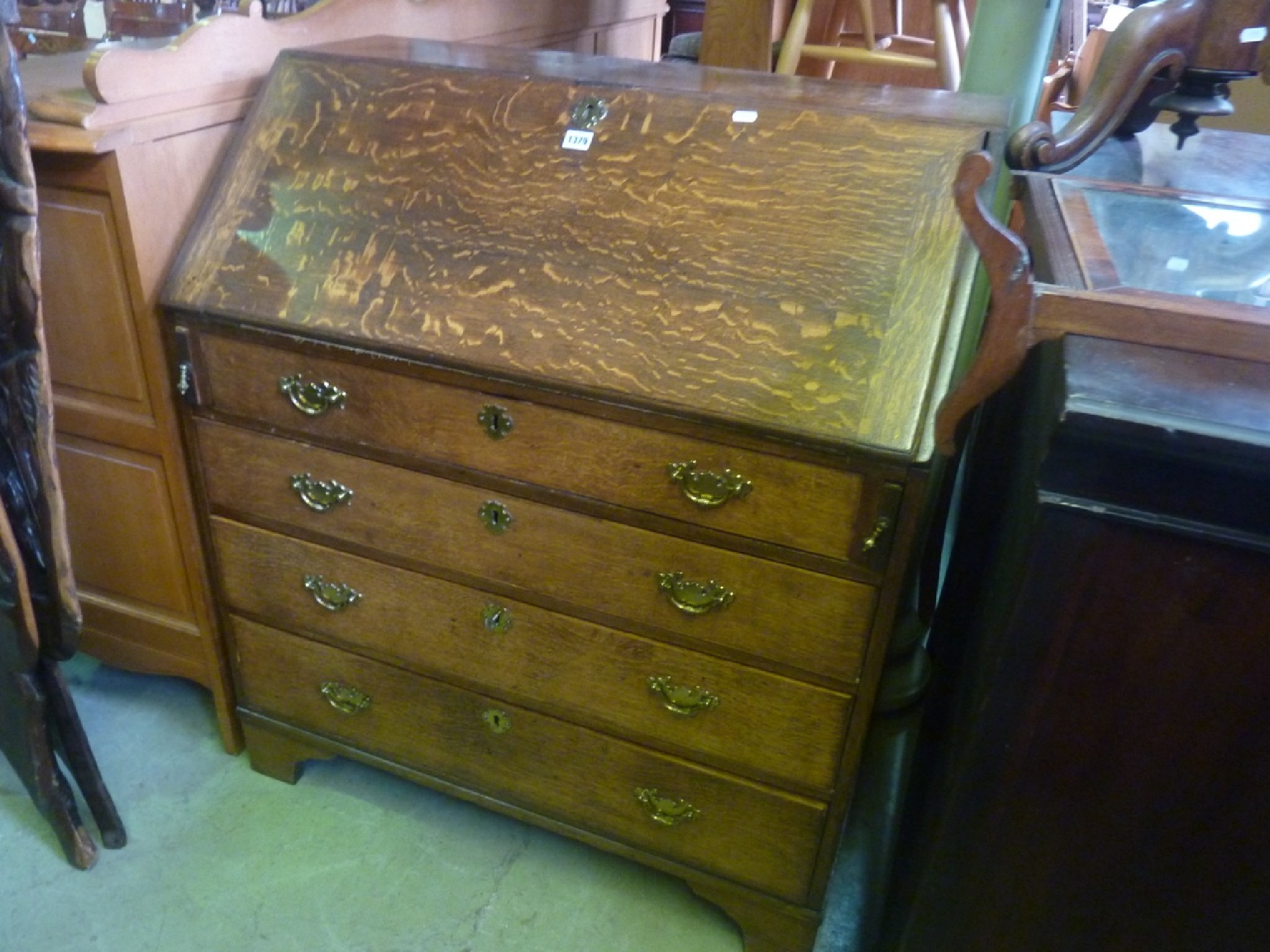 Appraisal: A th century mahogany writing bureau the fall flap enclosing