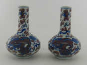 Appraisal: A pair of Chinese ceramic vases each with globe base