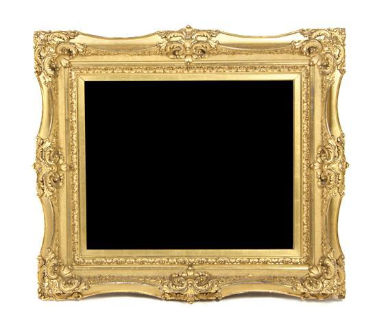 Appraisal: Carved and Giltwood Frame having a mirrored panel Height X