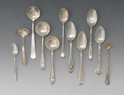 Appraisal: A Group of Eleven Miscellaneous Spoons Ladles Three engraved with