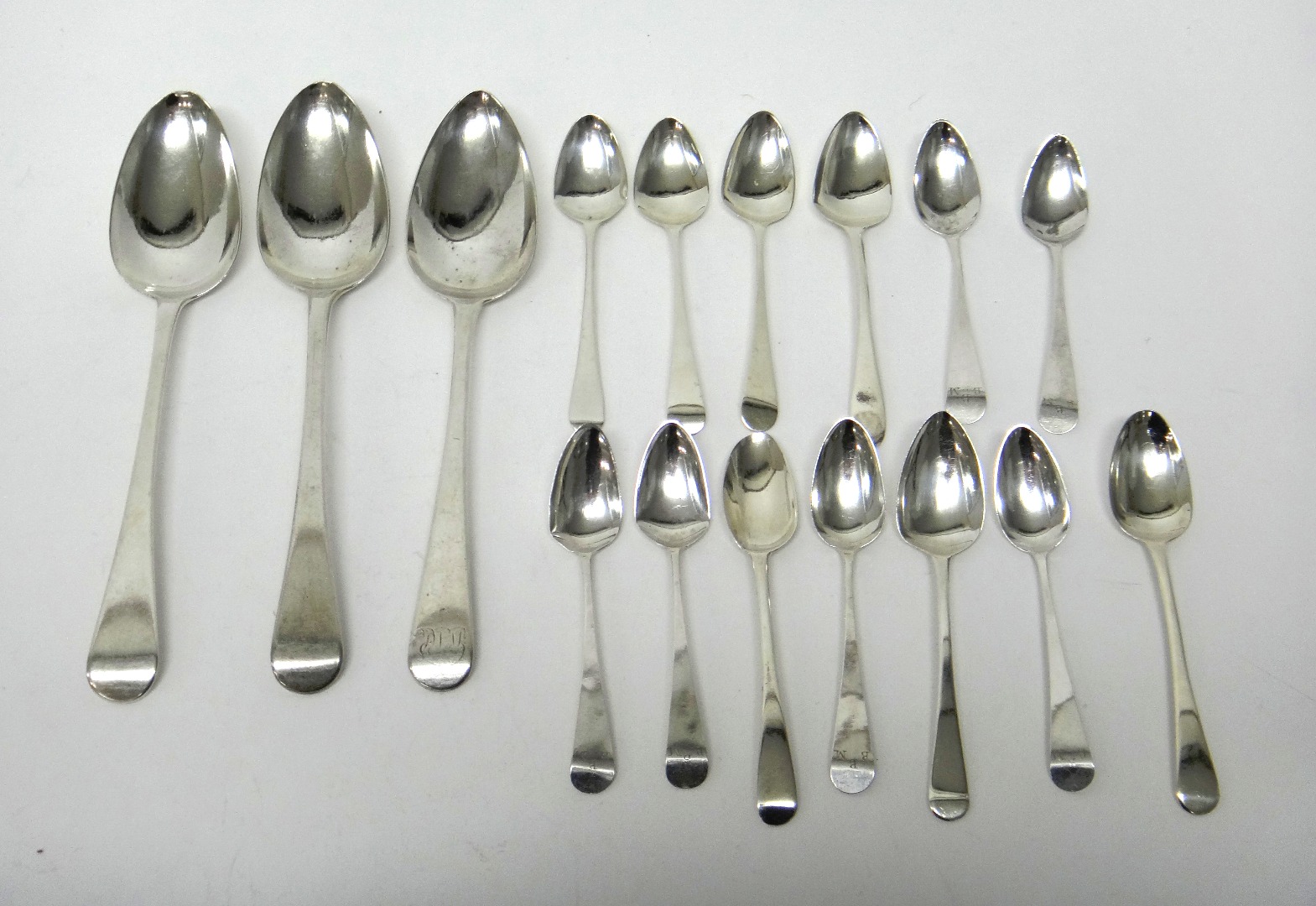 Appraisal: Silver table flatware comprising three Old English pattern tablespoons London