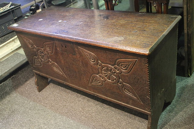 Appraisal: A TH CENTURY SMALL OAK COFFER with roundels and leaf