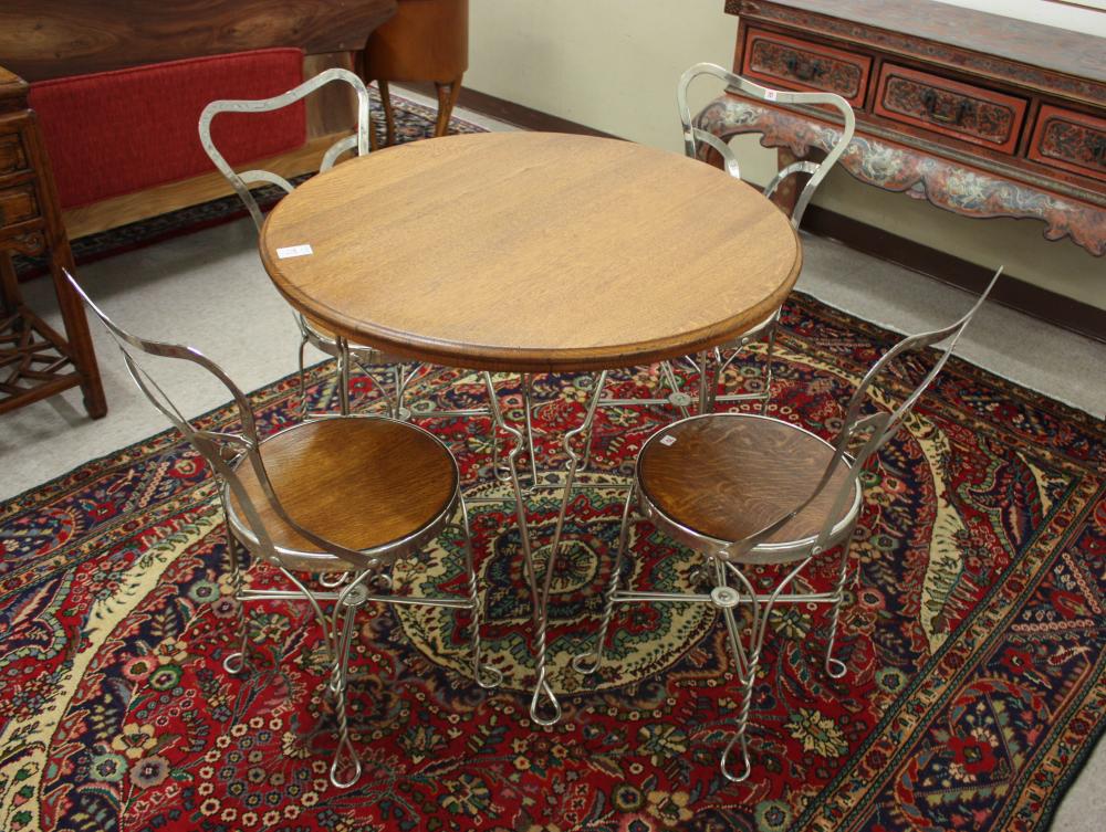 Appraisal: FIVE-PIECE CAFE' TABLE AND CHAIR SET attributed to the Royal