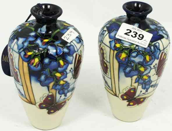 Appraisal: Pair Moorcroft Vases decorated in the Wisteria Flutter design height